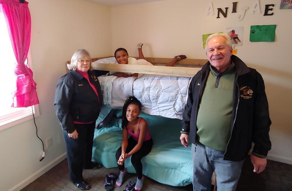 Lodge Trustee Stan Chesneski and Secretary Cheryl Chesneski participate in delivering bunk beds that were built by Lodge members and volunteers in conjunction with Sleep in Heavenly Peace. The looks on the children's faces was all the thanks anyone would need.(11/2/19)