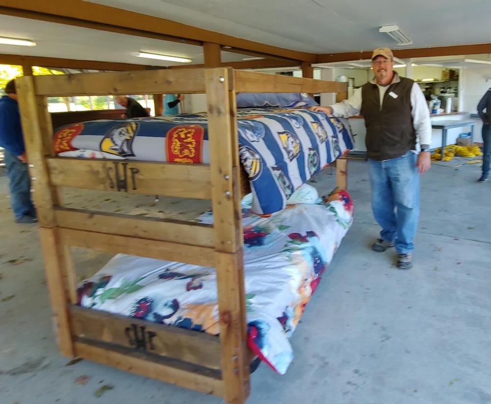 Lodge Member Steve Knowles stands beside a completed bunk bed. The Camillus Elks Lodge #2357 joined forces with Sleep in Heavenly Peace on October 13, 2019 to build bunk beds for children who might otherwise sleep on the floor. Sleep in Heavenly Peace's motto is "No kid sleeps on the floor in our town". We were able to purchase supplies with a $2,500 grant provided by Elks National Foundation. (10/13/19)