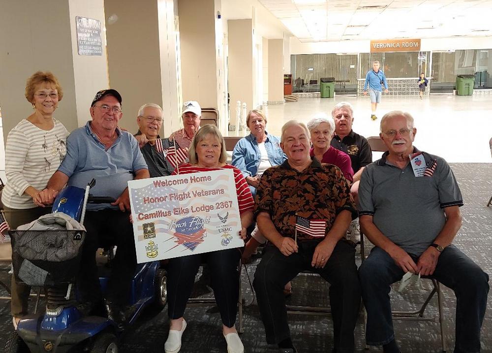 A group of Lodge members  await the arrival of veterans from their Honor Flight to Washington D.C. (September 2019)