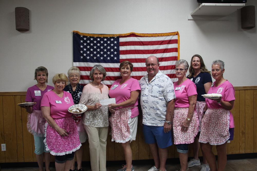 Elkette Pie Ladies selling slices of pie for charity.