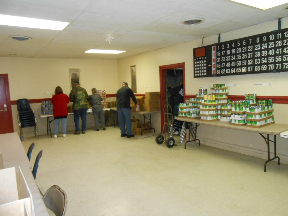 Food coming in for packing in the food baskets.  