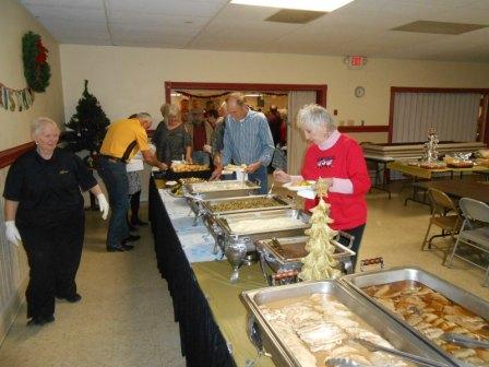 Our ER and his wife leading the buffet line