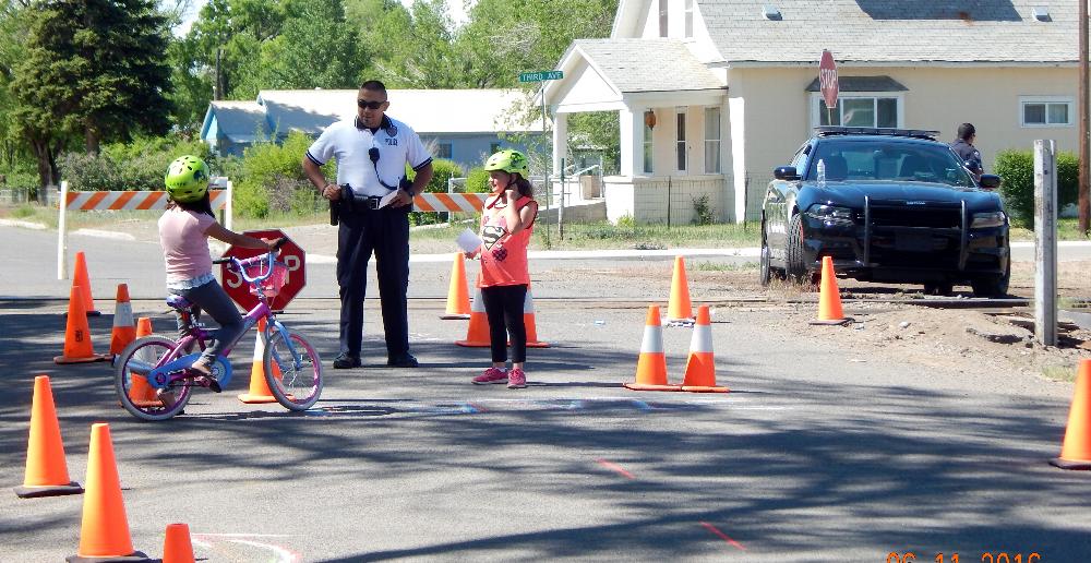 Kids riding through the obstacle course.