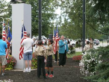 Scouts raising the flag