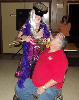 Carroll Ware won 1st prize in the first-ever Drag Queen Contest Sept. 22, 2012, and shows his appreciation to Exalted Ruler Ron Voisine.