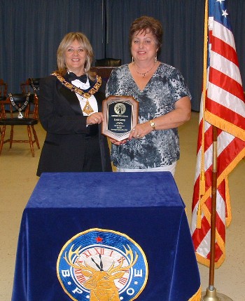 Exalted Ruler Julie A. Washburn presented 2006-07 Elk of the Year Linda Laney with her recognition plaque at the Sept. 26, 2007 meeting.