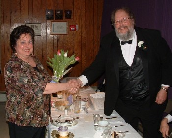 2007 Elk of the Year Linda Laney is congratulated by Exalted Ruler Arthur G. Morse.