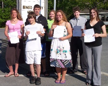 The Skowhegan-Madison Elks Lodge teamed up with Skowhegan Savings Bank in the summer of 2008 to honor eight youngsters for their achievements during Elks National Youth Week. The students from four area school districts each received a $50 U.S. Savings Bond. Pictured (front row, left to right) are Skylar Bisesti from Carrabec High School, Emily Madore from Skowhegan Area High School and Chelsea Rand from Upper Kennebec Valley High School. Back row: Katelyn Kniffin from Carrabec High School, Curtis Miller from Upper Kennebec Valley High School, Jessica Dean from Madison Memorial High School and Eric Axelman from Skowhegan Area High School. Absent from photo: Jeffrey Mercier from Madison Memorial High School. Skowhegan-Madison Elks photo