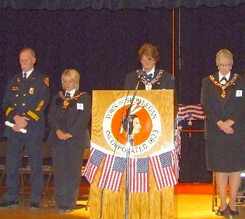 The Skowhegan-Madison Elks hosted a September 11th ceremony at the Skowhegan Opera House in 2009 to honor those who risked their lives during the tragedy. Pictured (left to right) at Lt. Marshall King of the Waterville Fire Department, Past Exalted Ruler Julie Washburn, Chaplain Betsy Bourdeau and Exalted Ruler Susan Horsman.