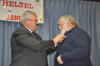 Grand Exalted Ruler Paul Helsel pins a GER Award pin on Edward "Ned" Goff of Skowhegan at a Nov. 10, 2008 luncheon. Goff earned the honor by sponsoring three new members within one year