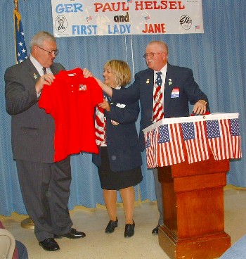 Grand Exalted Ruler Paul Helsel and First Lady Jane Helsel were presented with special red shirts commemorating the lodge's Red Shirt Friday to honor America's Armed Forces. Making the presentation at the Nov. 10, 2008 luncheon were Exalted Rulie A. Washburn and District Deputy Roy H. Bolton.