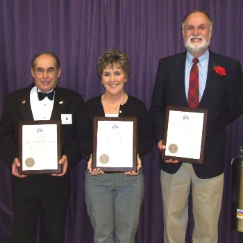 Honorees for the 2007-08 lodge year were presented with their plaques by Exalted Ruler Julie A. Washburn. Pictured (left to right) are Richard A. Corson, Officer of the Year; Louann Barnes, Elk of the Year; and Larry Ross, Citizen of the Year.