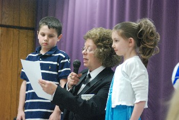 Drug Awareness Committee Chair Bobbi Alley with two contest winners.