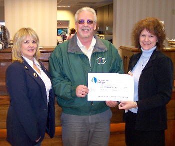 Skowhegan Savings Bank Marketing Officer Karen E. Hart (right) presented a $1,000 check to the Maine Children’s Cancer Program (MCCP) on Oct. 31. Also pictured are Robert T. Godin, chairman of the Maine Elks Association MCCP Private Sector Committee and Julie A. Washburn, Exalted Ruler of the Skowhegan-Madison Elks Lodge.