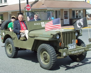 Past Exalted Ruler Alfred Carpenter was chosen as grand marshall for the 2010 Memorial Day parade. He's pictured riding in a vintage Jeep driven by Royce Knowles, a past commander of American Legion Post 16.