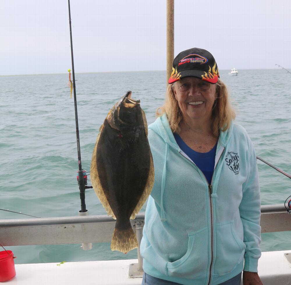 Arlene caught dinner during Jim K Scholarship fishing trip.