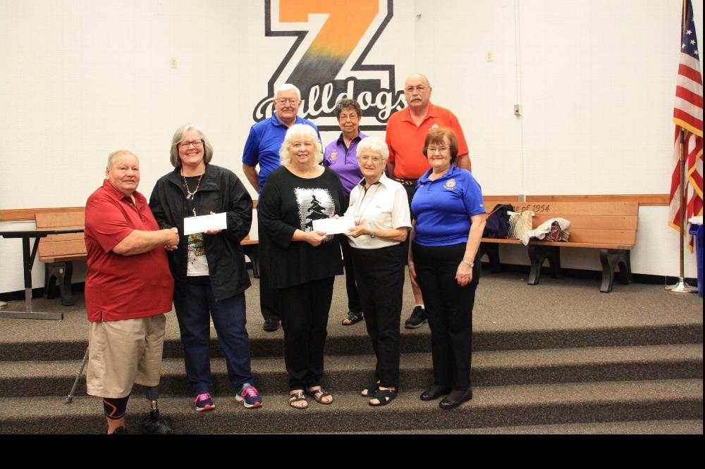 December 14, 2018 Elks Present Gift Cards to Homeless Teens of Zephyrhills High School 

Left to right:  Ken Fabiani, Exalted Ruler, Angie Shone, Principal, Diane Vaughn, Registrar, Elks Members:  Shirley Crawford, Alice Perry, Past Exalted Ruler (PER), Back Row: Bill Knapp, PER, Elsie McFarland, PER, David Moyer, PER
Photographer:  Cliff McDuffie
