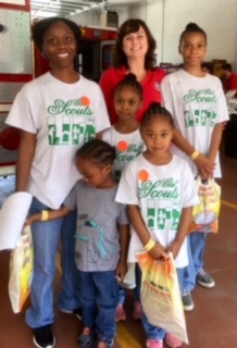 Christine Dodson with Girl Scouts that attended "Kids Safety Fun Day"