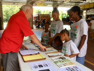 Dom Serra talks to the kids about Drug Awareness at "Kids Safety Fun Day