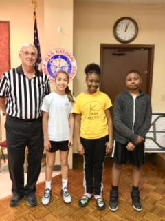 Chairman Jerry McCreless with State Hoop Shoot winners 1st place Kensi Stevens, 2nd place Neela Lamar and 1st place Javaris Morris Feb. 24, 2018