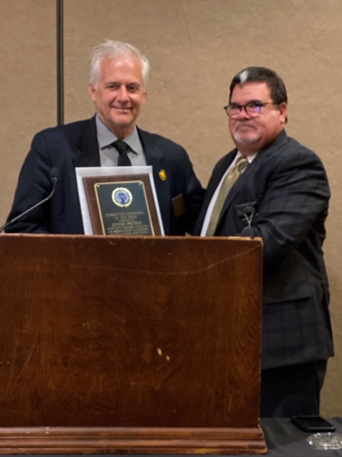 Steve Petrie accepts the 2020-21 Chairman of the Year award from Pres. Bruce Hayden