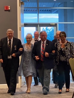 Tommy Thompson, PSP on the far left and Harriet Thompson, PSP Aux. on the far right escorting 2020-21 GEA President Bill & Lynda Lewis